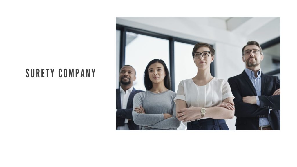 Surety Company - A shot of a group of surety agent standing in a surety company's office.